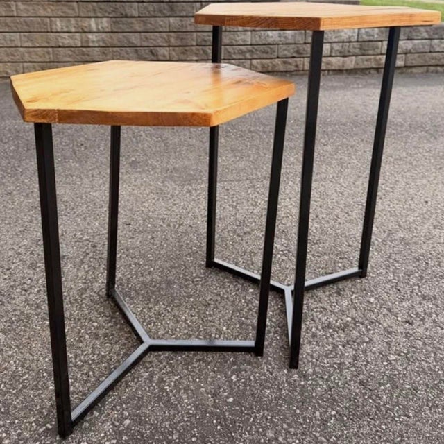 Set of two handmade hexagon nesting tables, sold together. Tops are reclaimed pine, hand cut and finished with Danish oil...