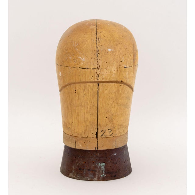 Millinery Head Block Mannequin, circa 1940, carved wood, together with wooden plinth. Overall: 12.5" H x 6.5" W x 8" D....