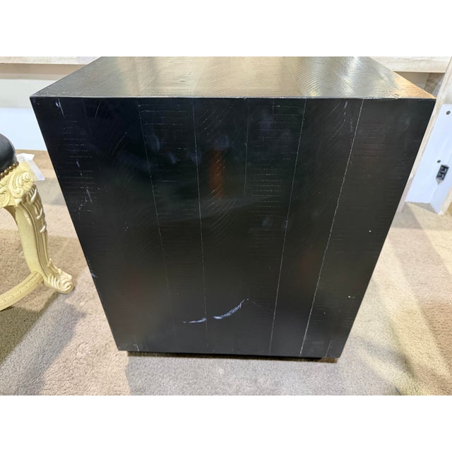 Sleek, modern, and effortlessly sophisticated, this Four Hands “Suki” nightstand delivers a refined minimalist aesthetic...