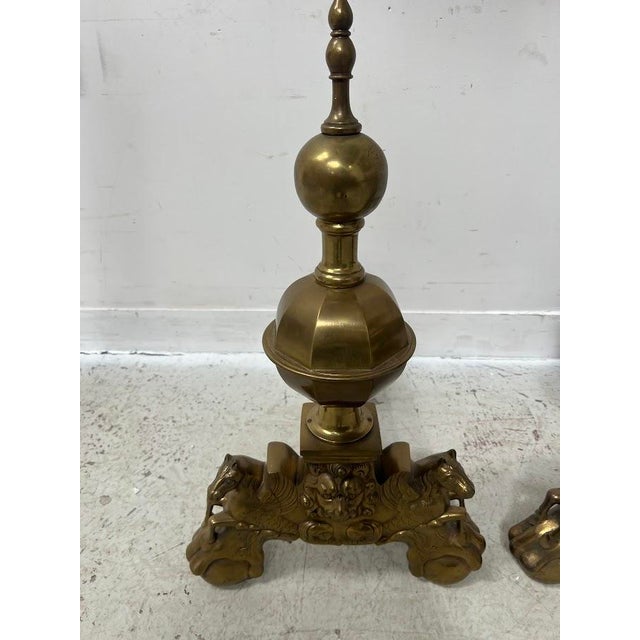 Important pair of Renaissance-style log andirons Central support in the form of superimposed balls The base is decorated...