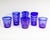 A set of cut to clear glasses. Included in this set are three taller glasses and three tumblers. Each glass has a blue cut...