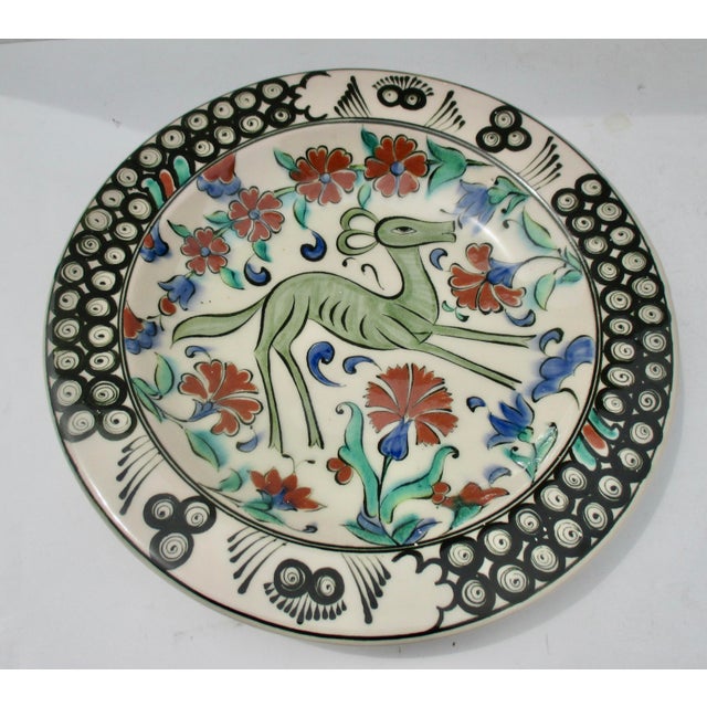Greek Icarus Platter with classic Greek village patterns and stylized deer and flower patterns from the Persian models....