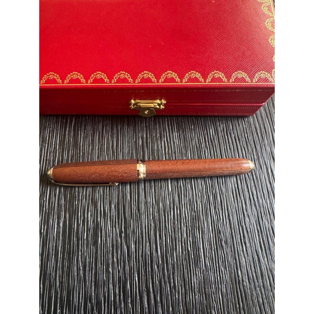 Louis Cartier Transatlantique fountain pen in Kotibe wood with palladium-finish trim, from a numbered limited edition, in...