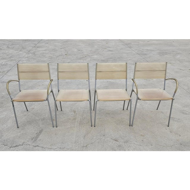 In this listing you will find a set of Postmodern Dining Chairs "Miss B" designed by Tito Agnoli for Bonacina. They...