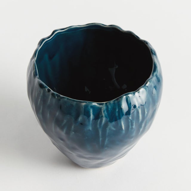 In an artisanmade slip cast design, this intricate natureinspired pot is a real treasure. The inherently beautiful glaze...