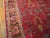 Antique Sarouk Persian Red 1925 Rug, Circa Date: 1925. This exceptional example of a Persian weave originates from the...
