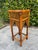 Crafted from burnt split bamboo with woven rattan and wood, this vintage pedestal features an open lattice design, woven...