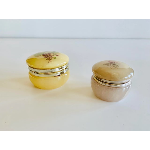 The translucent nature of the alabaster make this pair of trinket boxes very attractive and a desirable addition to any...