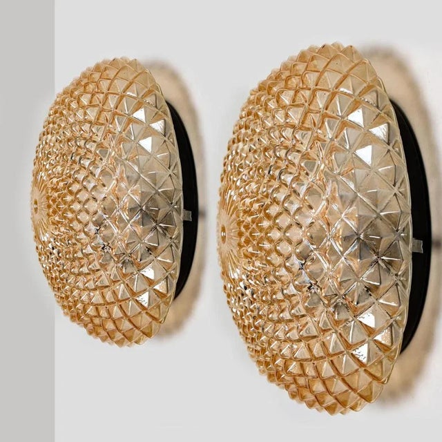 High quality modern thick textured amber colored glass light. Manufactured around circa 1960 in Germany, in the DDR-...