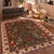 Enhance your home with the timeless craftsmanship of a hand-knotted Kargahi wool rug, celebrated for its tribal artistry,...