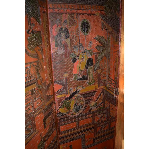 In bold red lacquer with scenes of birds, leafage, landscapes and pagodas with figures, this Ching Chinese red lacquer...