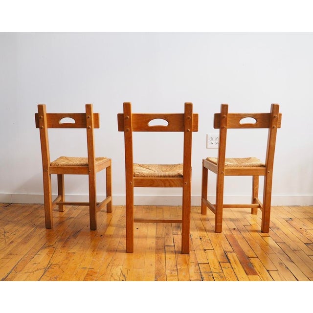 French 1950s Set of 6 French Brutalist Oak Dining Chairs With Woven Rush Seats For Sale - Image 3 of 5