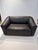 The DS-47 two-seater sofa from the Swiss manufacturer De Sede is crafted from 1/2 cm thick neck nappa leather and boasts...