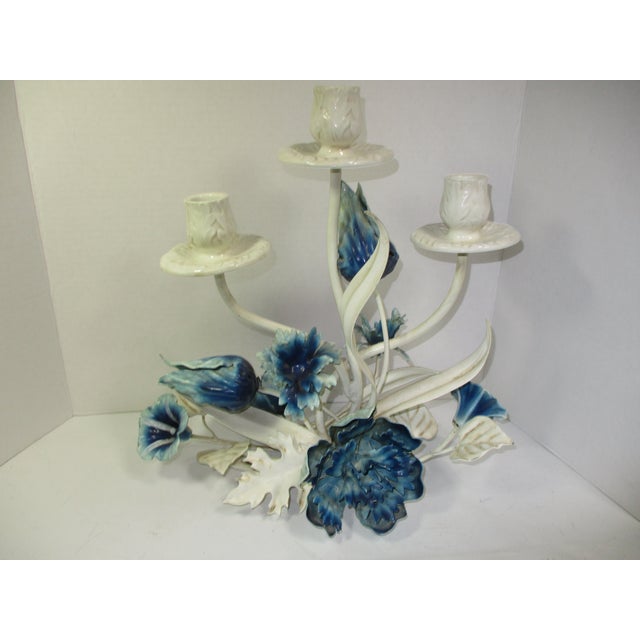 A vintage Italian tole three light candleholder. It is hand crafted from metal. The branches and leaves are hand painted...