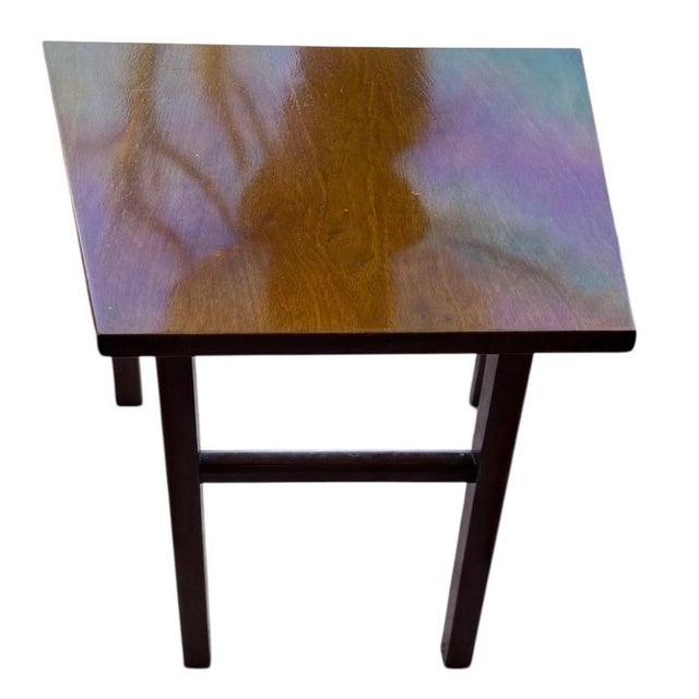 Made by Dunbar in Berne, Indiana, this solid walnut occasional table reflects the company’s refined mid-century...