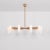 Odyssey round lg brass chandelier by schwung dimensions: w 152 x d 152 x h 131 cm materials: solid brass, frosted glass...