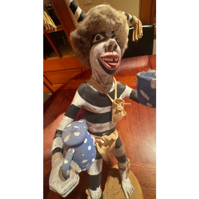Signed and dated 1982 Hano Clown Kachina by Hopi artist Clarence Cleveland of Second Mesa, Arizona. This highly expressive...