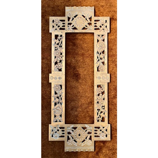 Pair antique 19th century Aesthetic Movement brass architectural grills dated 1883. Pierced rims with relief molded...