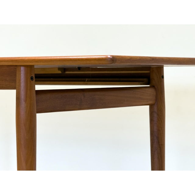 Brown Mid-Century Modern Danish Teak Extending Dining Table by Johannes Andersen for Heals, 1960s For Sale - Image 8 of 17