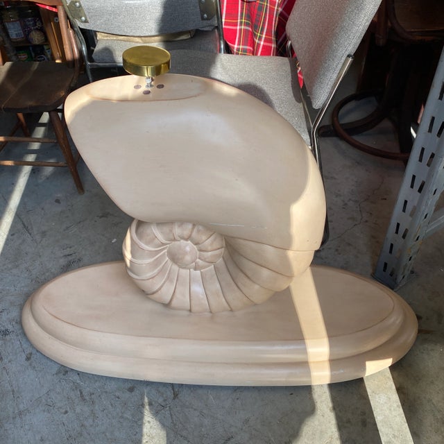 This is a beautiful nautical shell console table base. A perfect piece for the interior designer or the enthusiast!