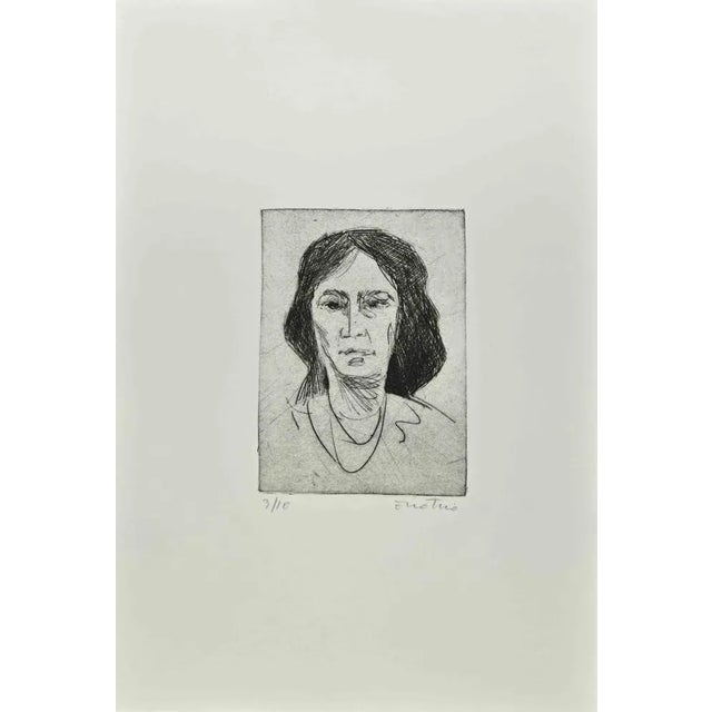Woman is an Etching realized by Enotrio Pugliese in 1963. Limited edition of 10 copies numbered and signed by the artist....