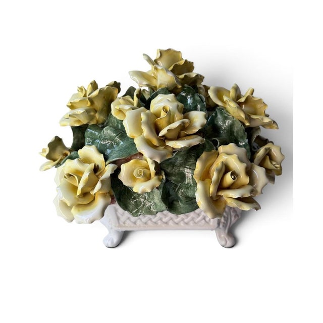 vintage Italian Capodimonte-style porcelain floral arrangement featuring handcrafted yellow roses and green leaves set...