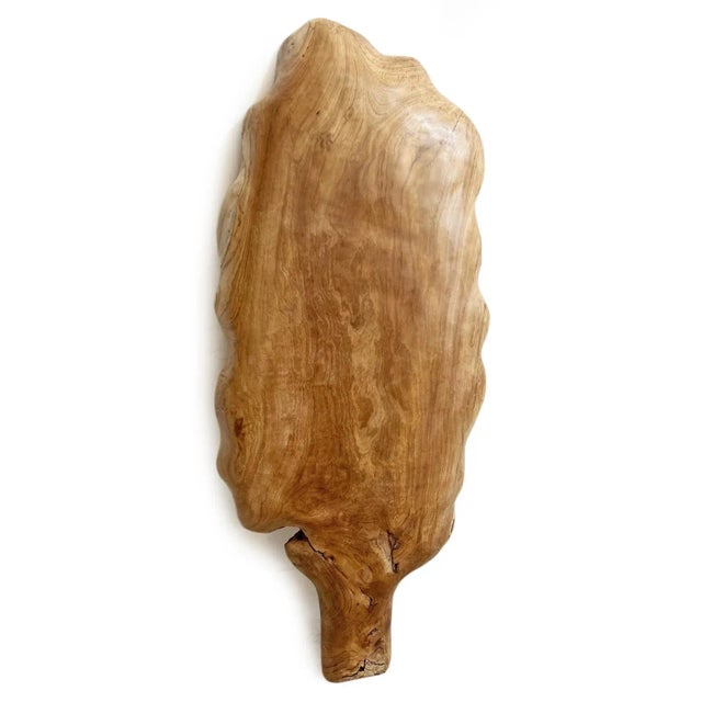 Beautiful large hand carved and sanded teak wood banana leaf. For use as wall art or display platter. Each is unique and...