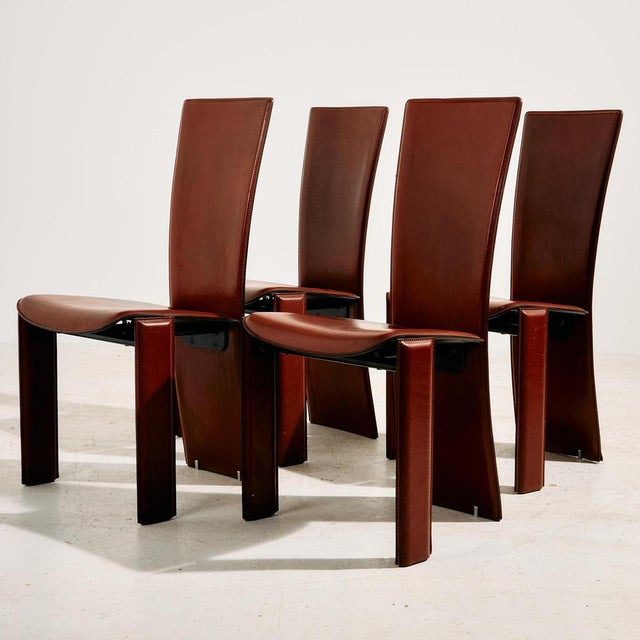 Italian postmodern dining chairs designed by Pietro Costantini in the 1980s. The chair has exciting shapes and is...
