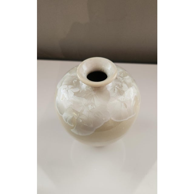This is a genuine quality ceramic decorative vase with an etched signature on its bottom. It has only been used in a small...