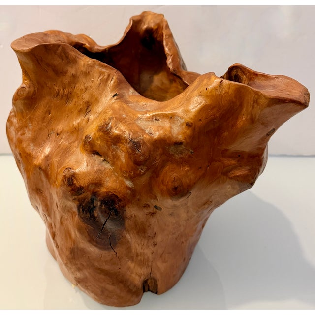 This item is a hand-carved root wood or burl wood bowl (also referred to as a vessel or sculpture). These pieces are...