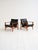 Set of two teak armchairs with black leather upholstery. Designed by Inge Andersson for Bröderna Anderssons, 1960s. Set of...