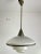 This pendant lamp was designed by Otto Müller in 1931 and produced by Megaphos/Sistrah Licht GmbH in Germany. It is...