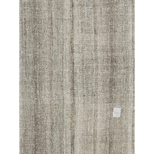 A vintage Turkish flat-woven carpet from the mid-20th century.