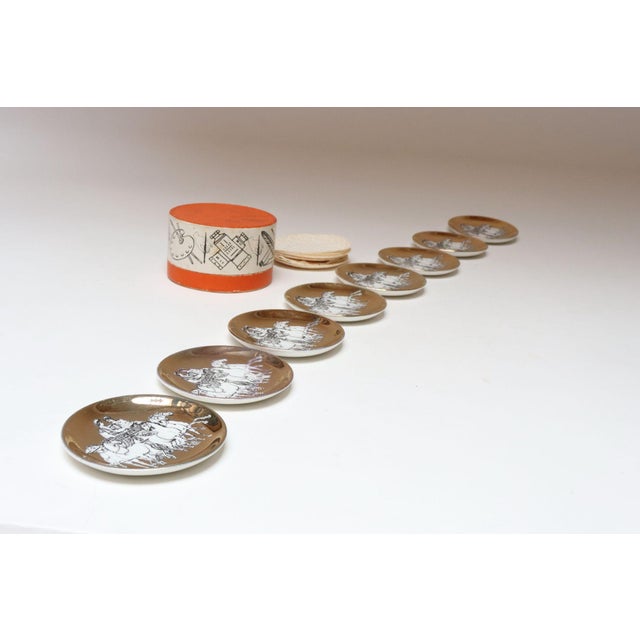 Complete set of eight Roman Chariot motif coasters with original box by Piero Fornasetti for Fornasetti Milano made...