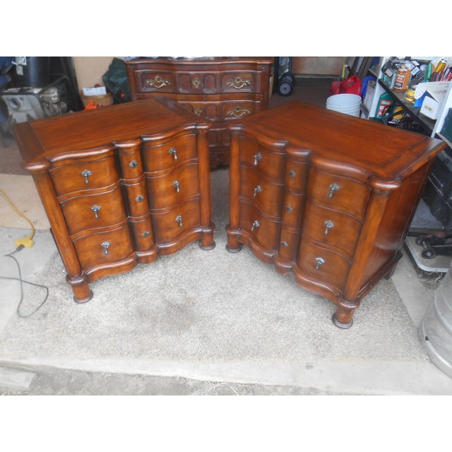 I have a Gorgeous pair of Baker Furniture Milling Road Scallop Nightstands in excellent vintage condition. This pair of...