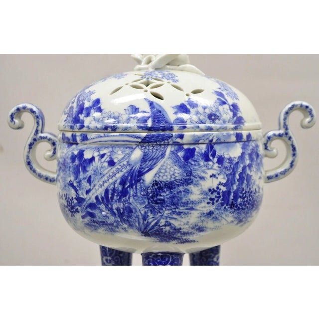 Antique 19th C Blue and White Chinese Porcelain Footed Incense Burner. Item features blue and white scenes with birds and...