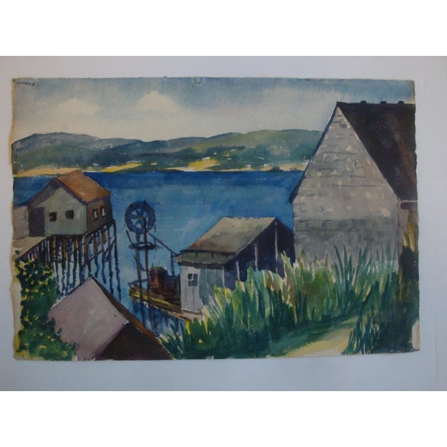 Fabulous midcentury watercolor landscape painting of a deep blue bay harbor or cove inlet built up around wooden work shed...