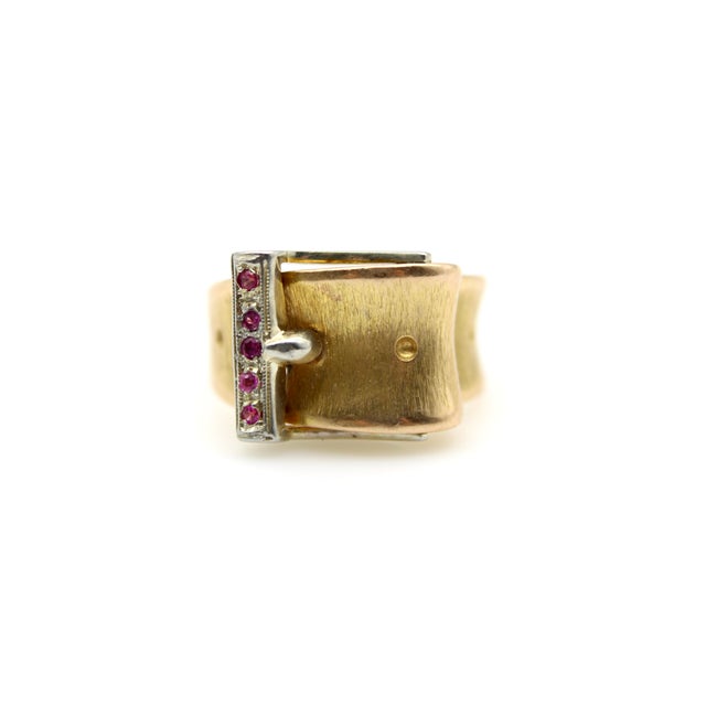 Circa the 1950’s or 1960’s, this Italian 18k gold ring is a modern take on the buckle ring, a jewelry motif that has been...