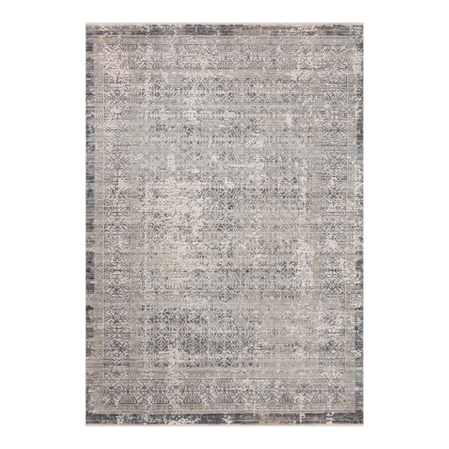 Area rugs in the Alie Collection have an elevated antique look and plush, modern feel. The rug’s underlying traditional...