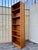 Vintage Mid Century Modern Danish Teak Bookcase by Domino Mobler. Circa 1970s Features a modern Scandinavian minimalist...