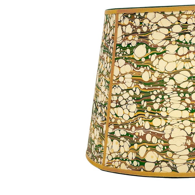 Marbled paper in a wonderful green, gold and brown pattern; trimmed in two colors of grosgrain. Available in 2 sizes: (8″...