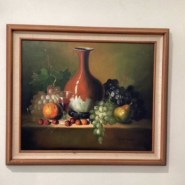 The vintage painting on canvas still life realistic tabletop by Frank Lean is an original, handmade oil painting featuring...