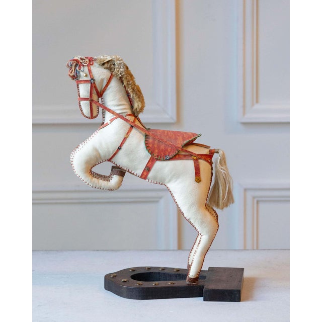 Charming and sculptural, this French decorative horse from the 20th century captures the elegance and vitality of...