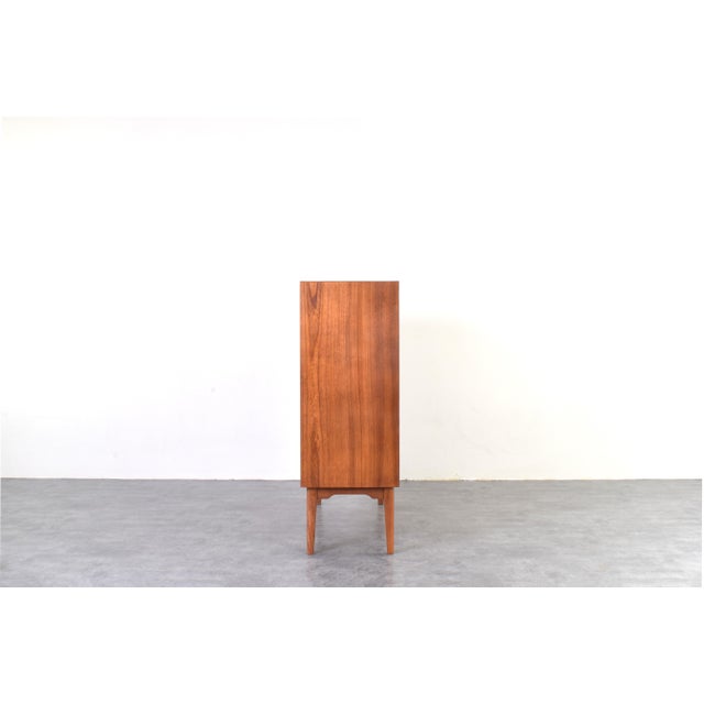 This teak highboard was designed by the designer couple Rolf Rastad & Adolf Relling in the 1950s and manufactured by...