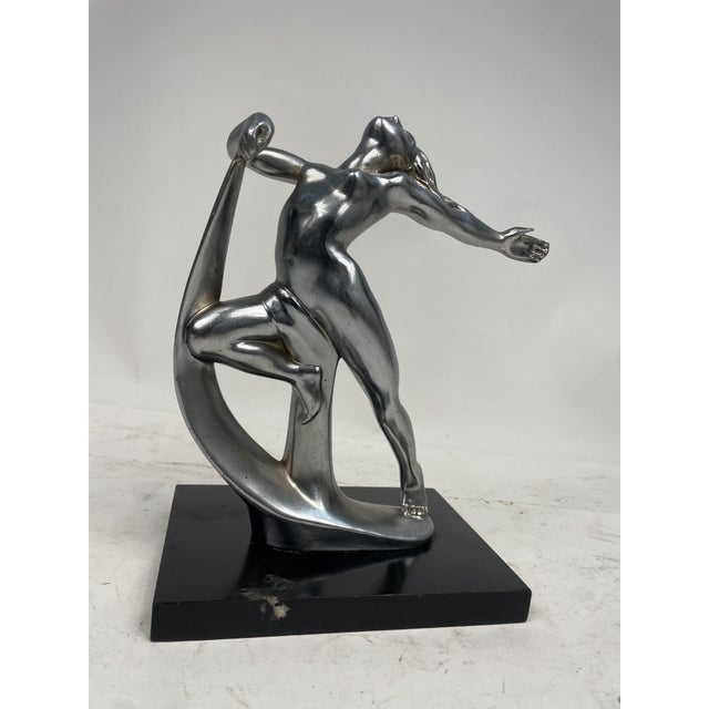 Beautiful Art Nouveau metal statuette with wooden base, 1920s. Excellent furnishing object