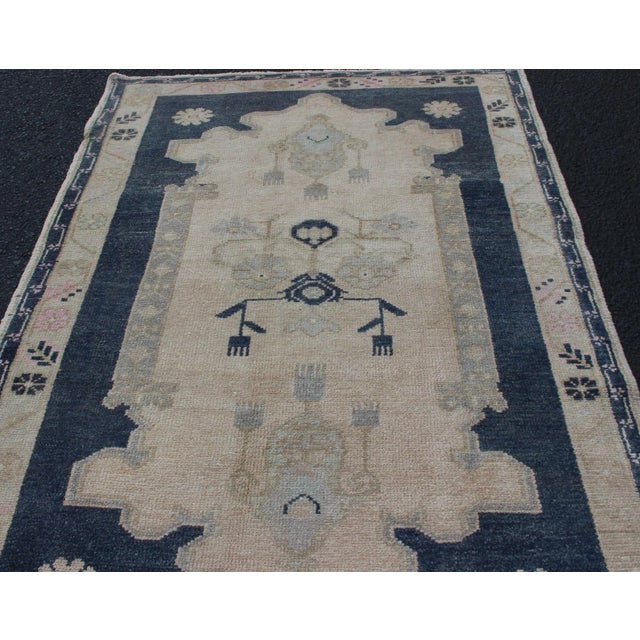Blue and Cream Medallion Vintage Turkish Hand Knotted Oushak Rug With Tribal Geometric Design For Sale In Atlanta - Image 6 of 9