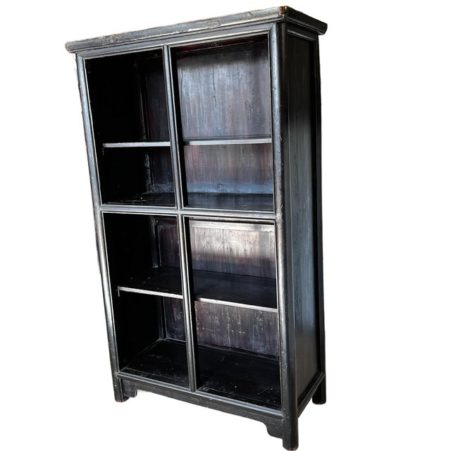 This is a solid bookcase from Shanxi Province, North Central China. It is solidly built in the traditional method. The...
