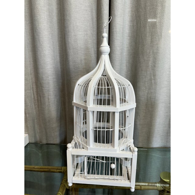 Beautiful and rare Palm Beach Estate sale find white dome shaped bird cage.