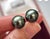 11 MM Tahitian Black Pearl Stud Earrings 14 Karat White Gold perfect pair made in 14 Karat Yellow gold Backs are made of...