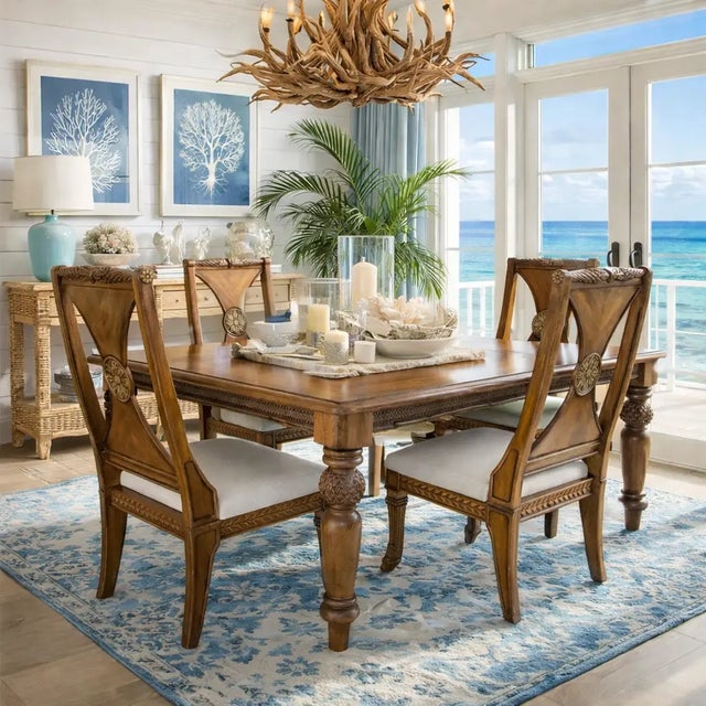 Infused with the refined charm of island living, this Tommy Bahama style dining set combines a substantial extendable...